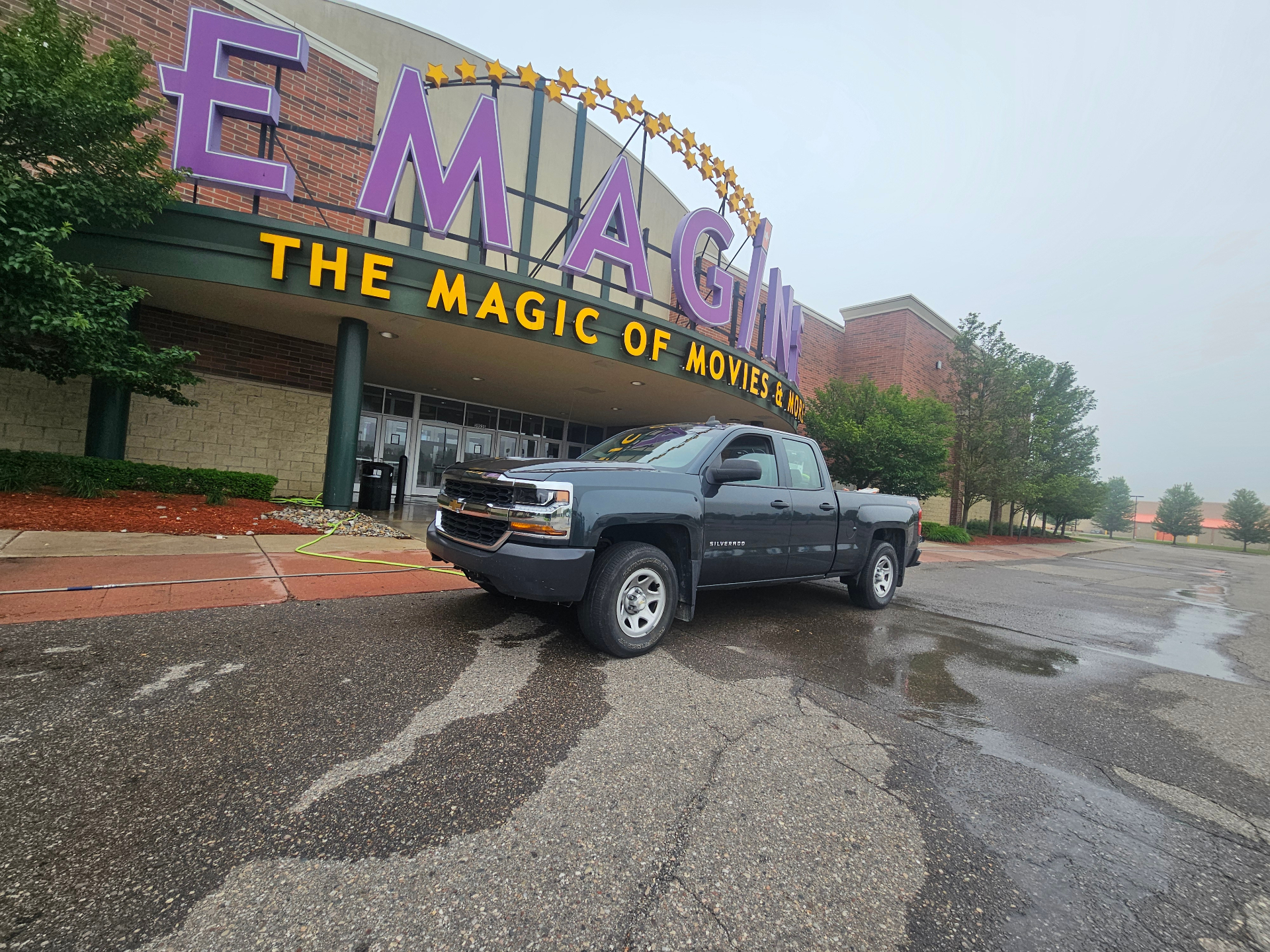 Reliance truck at Emagine Theater after parking lot cleaning